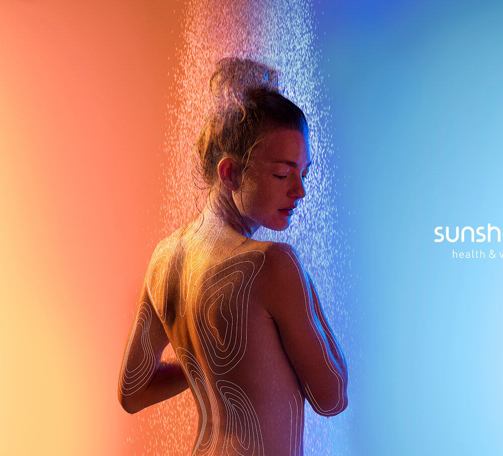 woman in shower with uv light
